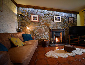Enjoy a woodburning stove at Auld Orwell Cottage Self Catering Accommodation